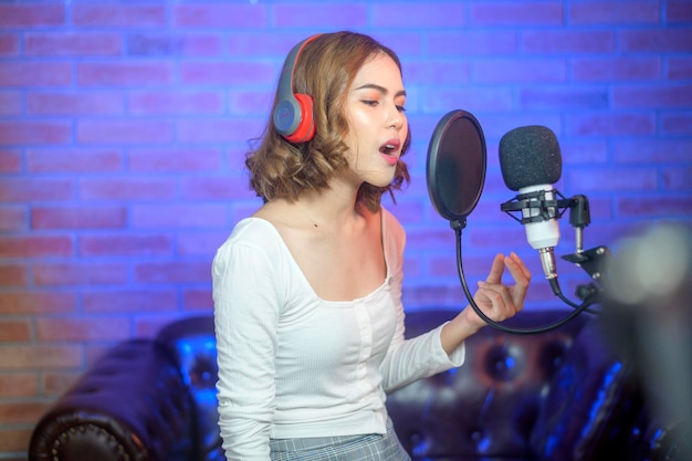 Voice coaching session showing proper breathing and posture for singing performance