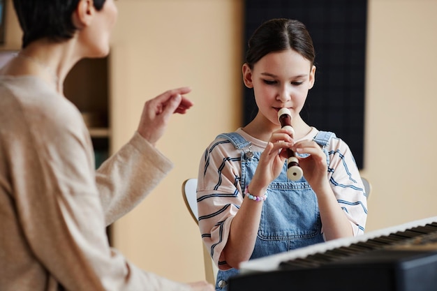 Professional singing lessons instructor teaching vocal techniques and music training for students in Malaysia